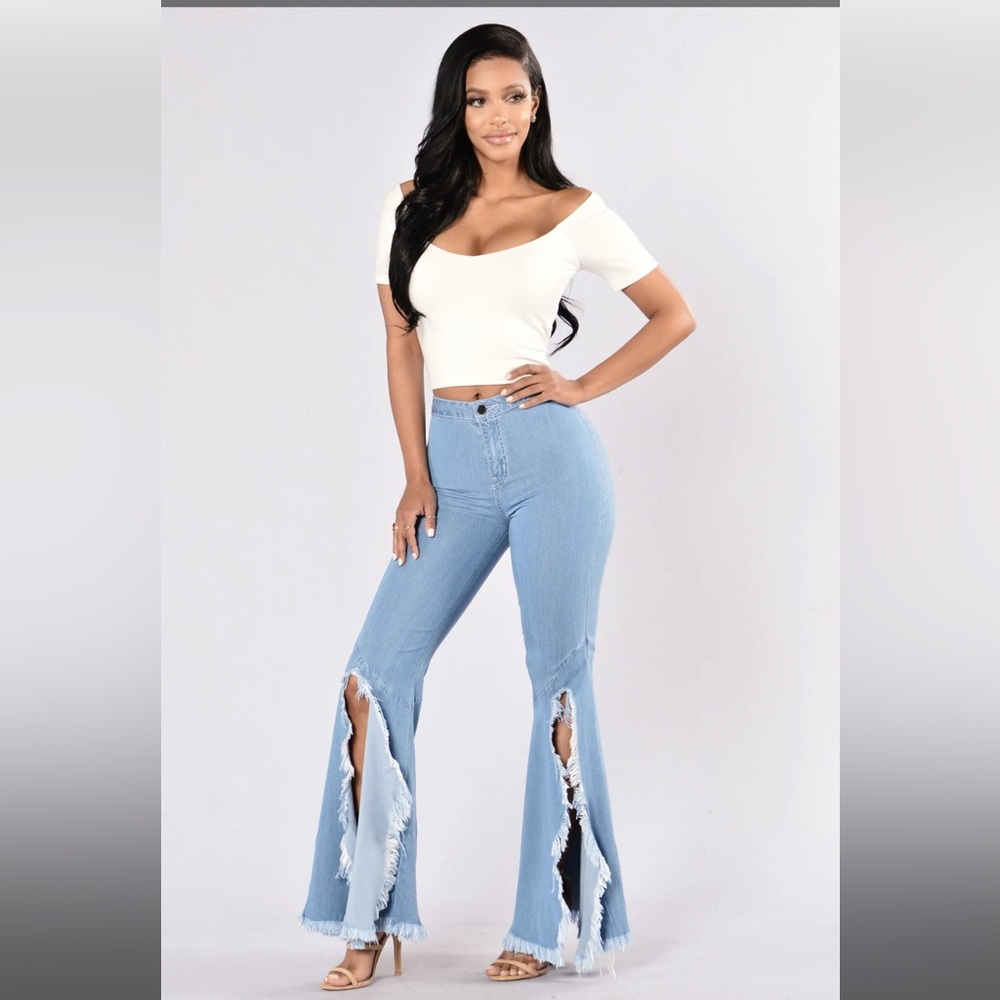 High waist distressed bell bottom light wash stretch jeans